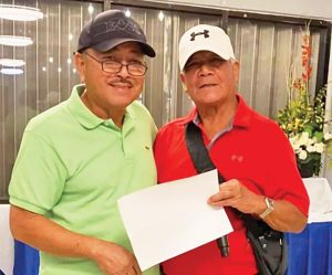 Mike Cruz, left, won the Fil-Taga Golfers Association September Ace