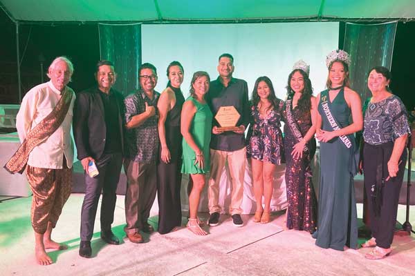 Caravan of Foods’ Salam and Jihan Younis are presented with the Green Business of the Year award at last Friday’s Green Gala