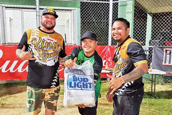 Budweiser King of the Diamond Labor Day Softball Tournament cornhole tournament winners Ikluk Masayos and Patrick Deleon