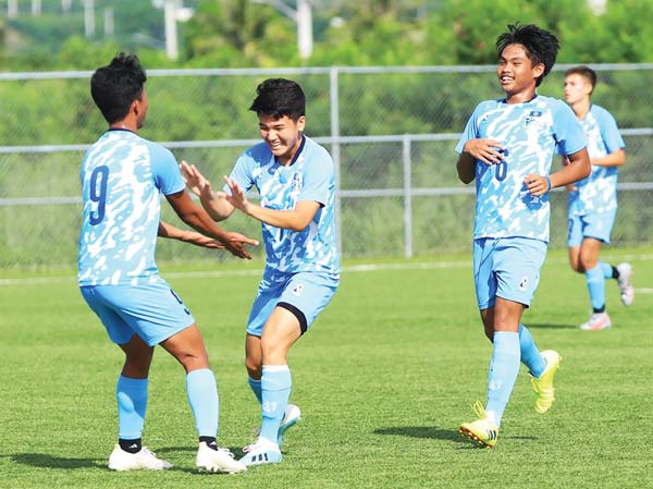 The NMI Boys U18 National Team’s Jeremiah Diaz, left, and Kohtaro Goto