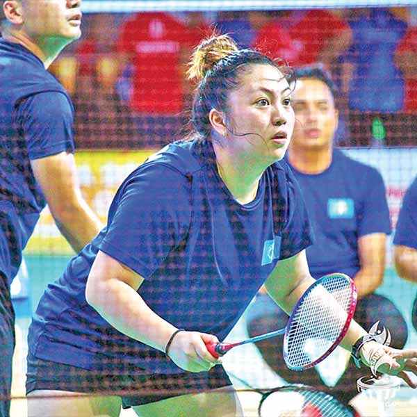 CNMI’s Janelle Pangilinan gets ready near the net.