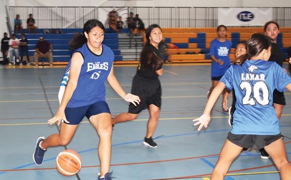 Grace Christian Academy’s Azriel Fatialofa bring up the ball against Dandan Middle School.