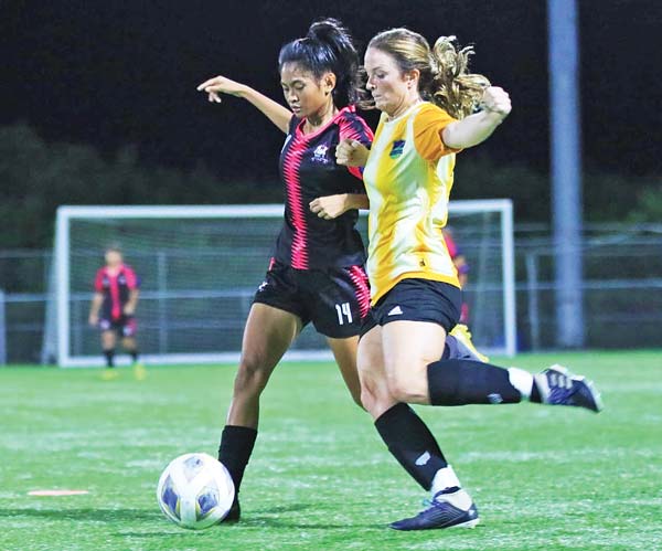 Southern United Football Club’s Allyssya Angeles, left, and Kanoa Football Club’s Kelsey McClellan