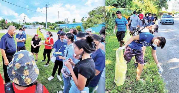 Saipan Mayor David M. Apatang talks to members and officials of Rotaract and its partners