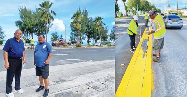 Saipan Mayor David M. Apatang and staff Jack Villagomez pose for the camera after checking the workers-volunteers