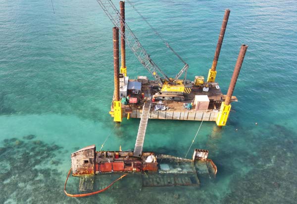 This file photo show work being done to salvage the derelict Lady Carolina