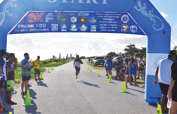 Run Saipan president Edward Dela Cruz Jr., seen here crossing the finish line the Gecko 500 last Sept. 11.