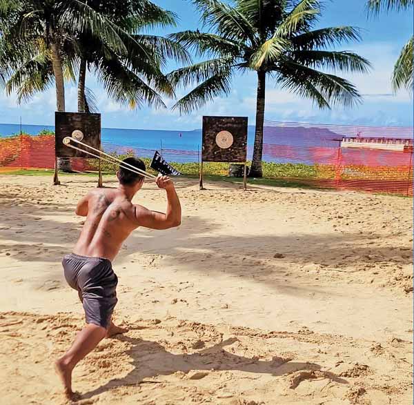 Jester Rosario from Rota gears up to sling a stone at the bullseye during last weekend’s first-ever All-Marianas sling stone competition.