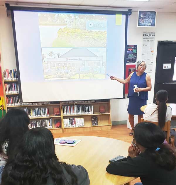 MTEC acting chair Vicky Benavente speaks about job opportunities in the tourism industry during the presentation of MTEC and the Marianas Visitors Authority.