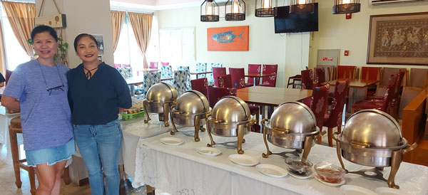 Tom Yum Restaurant cook Somsaat and owner Phannee Regan welcome everyone to their Thai lunch buffet