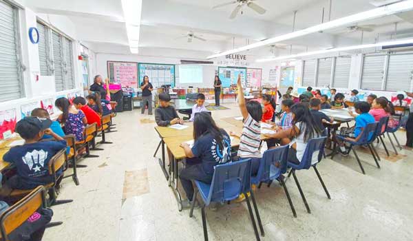 Teach Children to Save: Team Tinian conducted a presentation on the importance of how to save to 40 third-grade students at Tinian Elementary School.