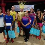 Marianas Visitors Authority managing director Priscilla Maratita Iakopo awards winners of the World Tourism Day Sunset Fun Run