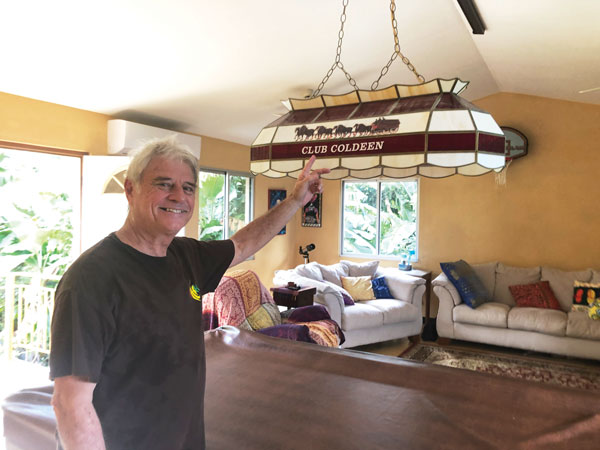 Bob Coldeen inside his sports- and Hollywood-theme mancaves