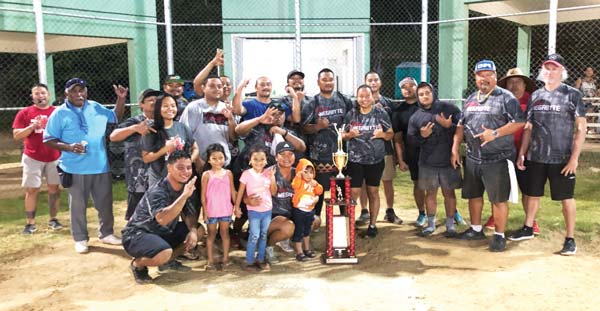 MegaByte players and coaching staff pose for a group photo with the perpetual trophy.