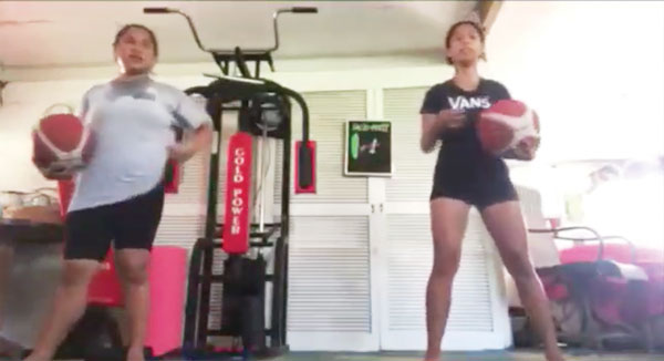 Lency Sagarino, left, and Andrea Ramos perform the Phil Handy dribbling