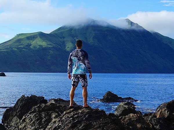 Salty Skin Pacific’s latest release, a long-sleeve rash guard, has “Keep our oceans healthy” printed on the back. 