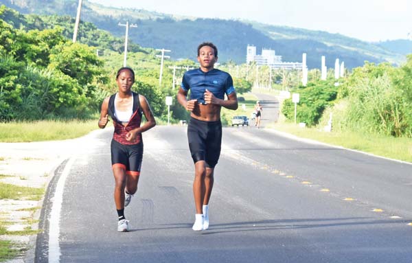 Kaithlyn Chavez, left, and Isaiah Aleksenko tackle the 5-kilometer run