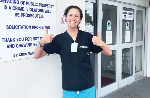 Dr. Lily Muldoon poses in front of the CHC Emergency Department
