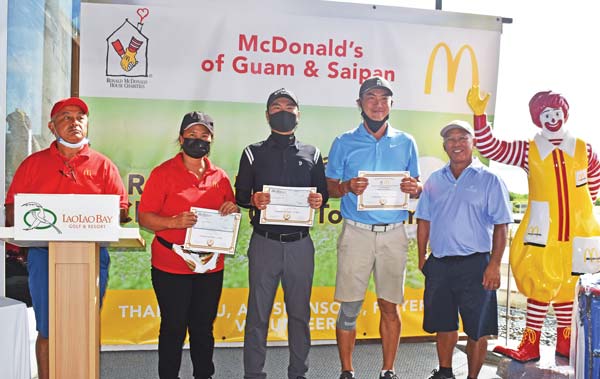 Championship flight runner-up Sun Ho Kang and third place Feng Chun Jin