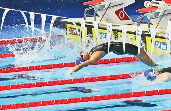 Shoko Litulumar at the start of the women’s 50m backstroke