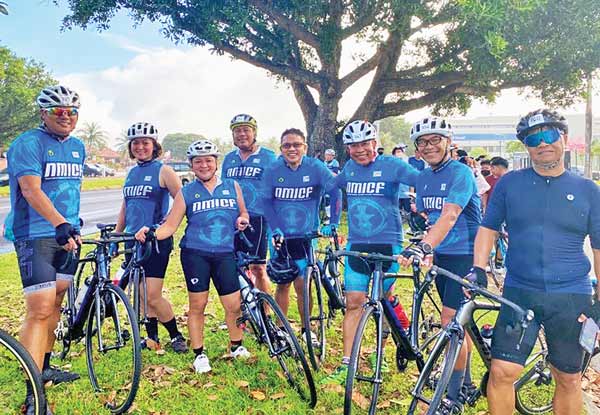 Northern Mariana Islands Cycling Federation members pose for a group photo before taking part in last weekend’s Tour of Guam